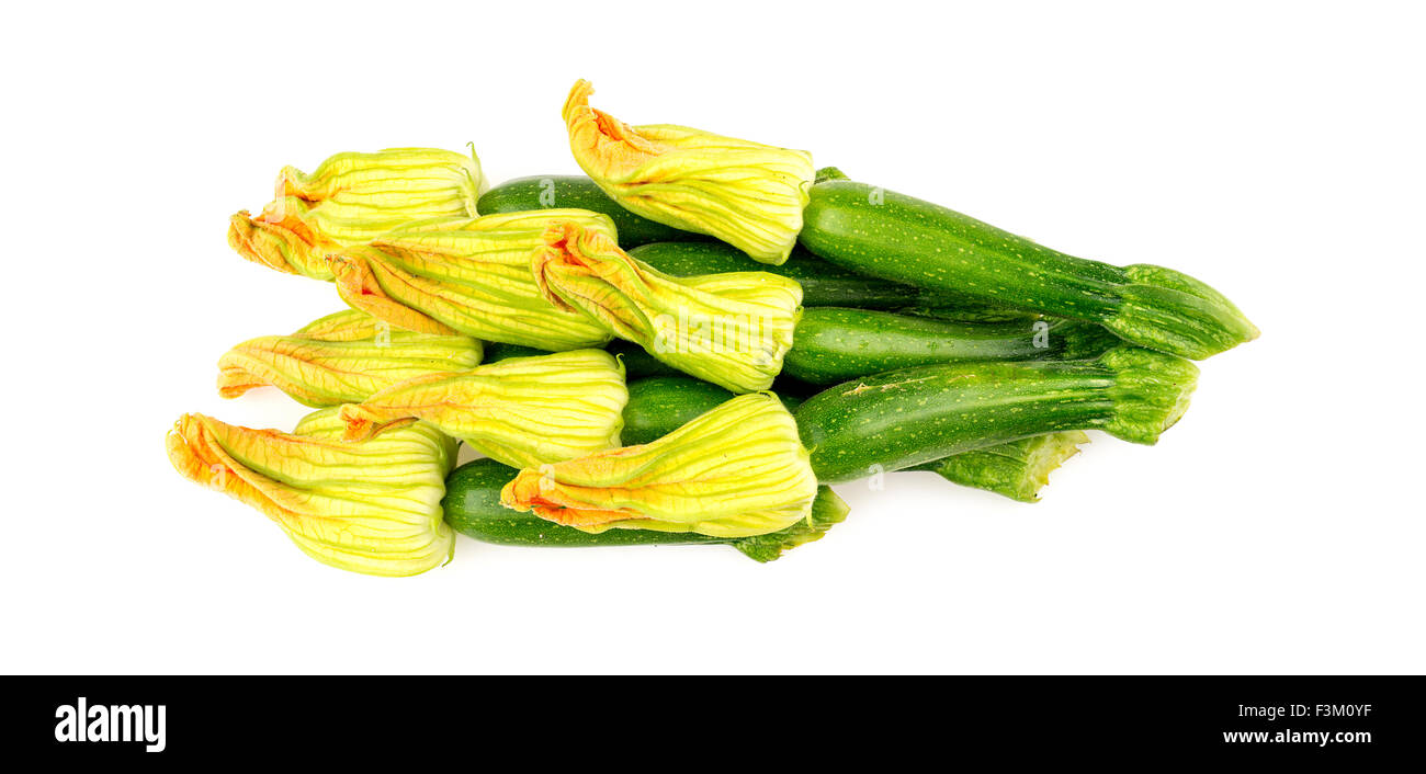 Pile of zucchini flowers isolated on white background Stock Photo