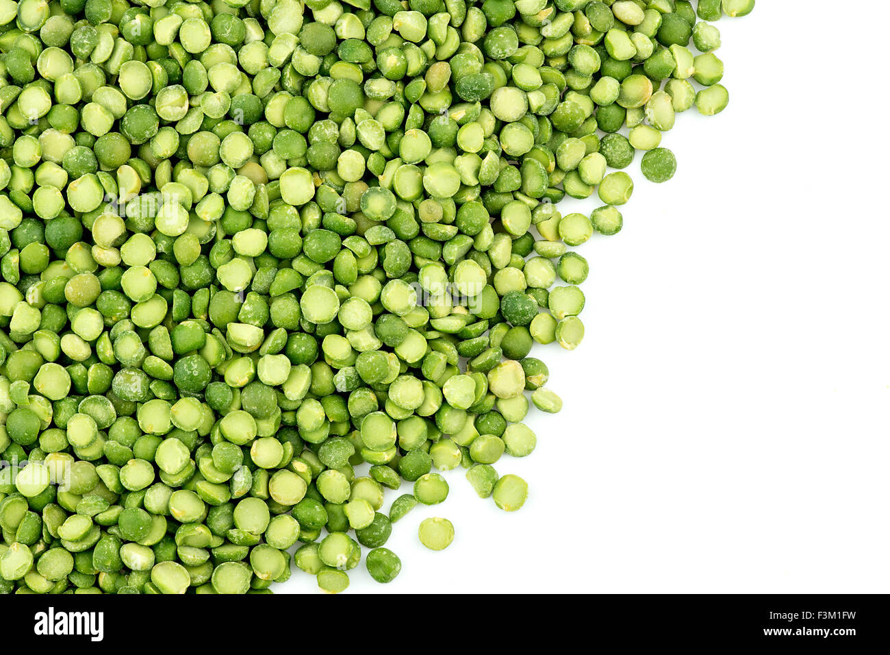 Green split peas isolated against white vegetarian background Stock Photo