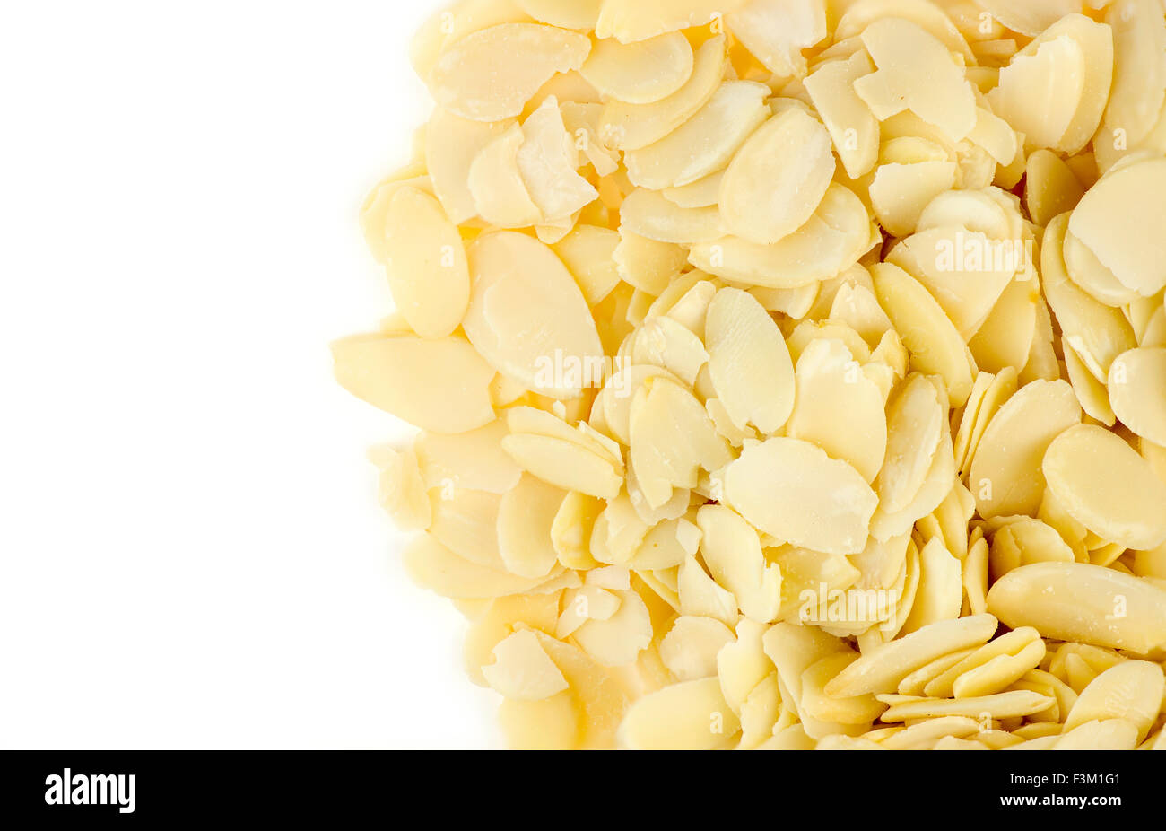 Aerial view of almond flakes with white copyspace Stock Photo