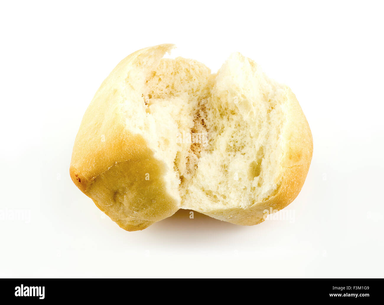 Fresh bread roll torn broken cut in half Stock Photo