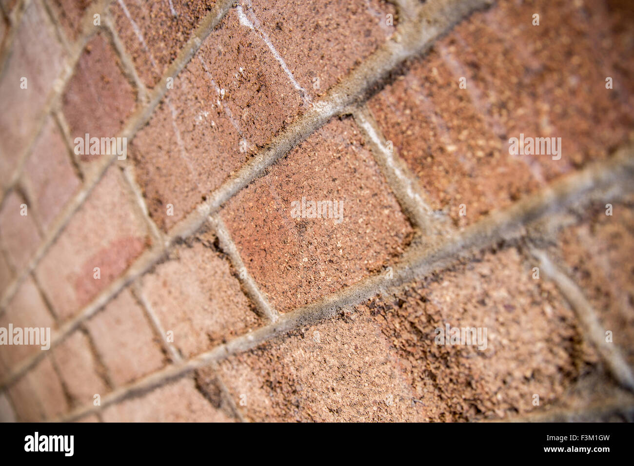 Looking down old weathered brick wall with shallow depth of field in Sydney, Australia Stock Photo