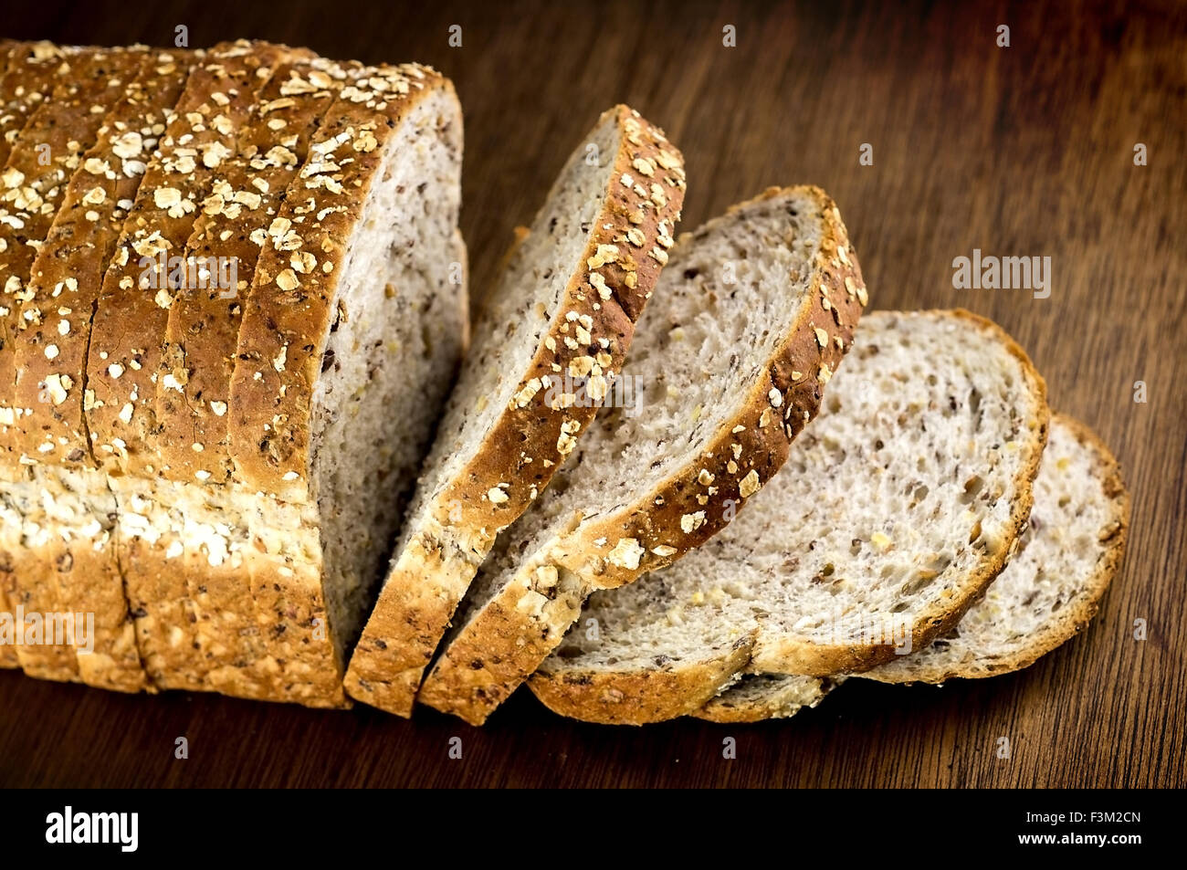 Macro closeup of multi-grain whole wheat loaf of bread Stock Photo