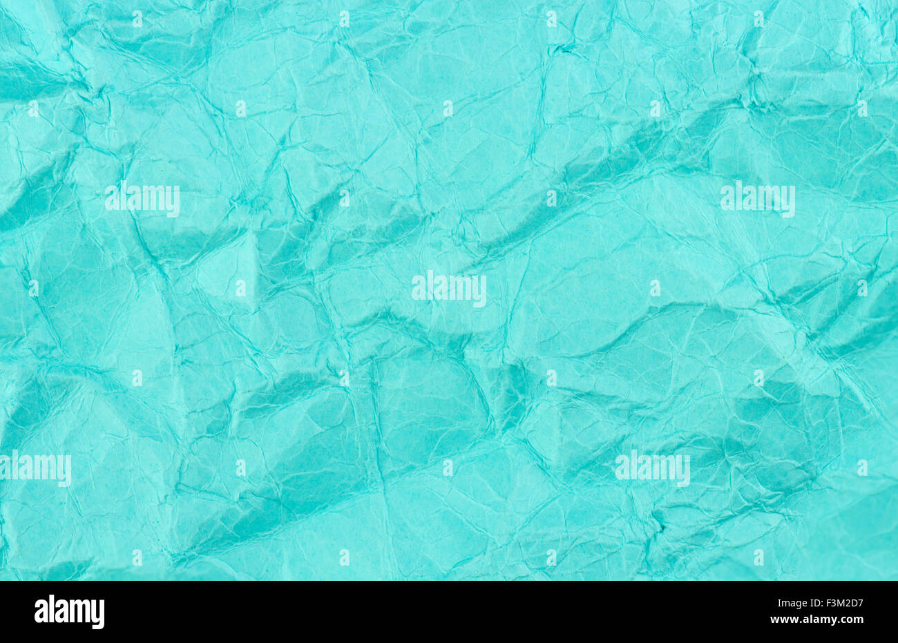 Blue teal crumbled recycled paper background texture Stock Photo