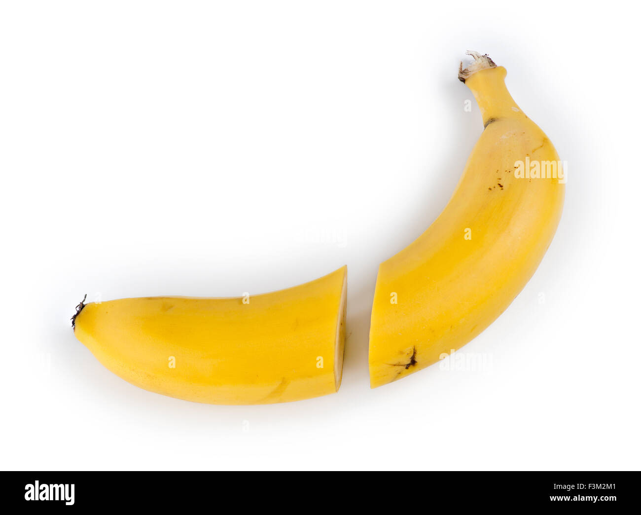 Perfectly cut halves of ripe yellow banana Stock Photo