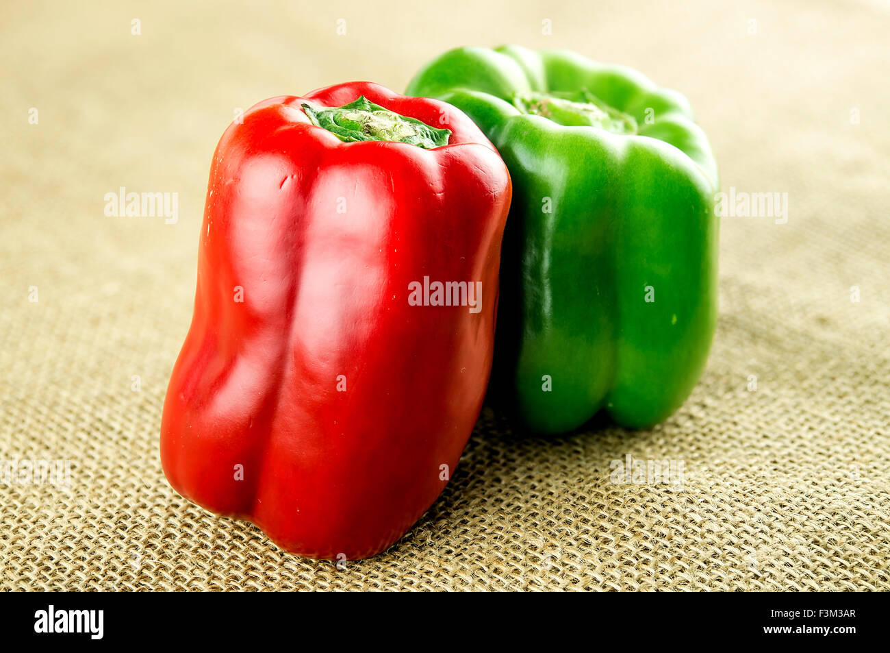 Bright red and green peppers Stock Photo