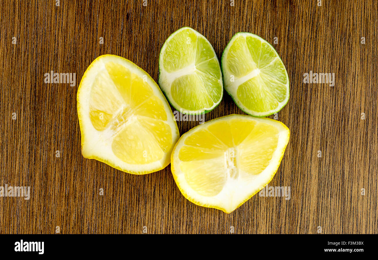 Aerial macro of lemon and lime wedges Stock Photo