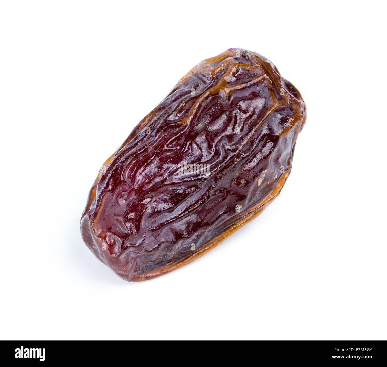 Closeup of date fruit against white Stock Photo