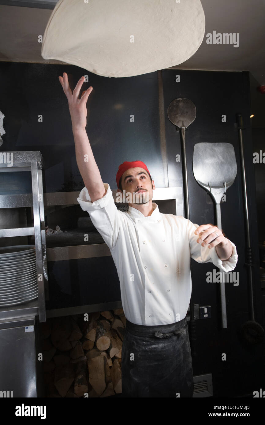 Pizza dough throwing, Strada, Italian chain restaurant, Covent Garden, London, England, UK Stock