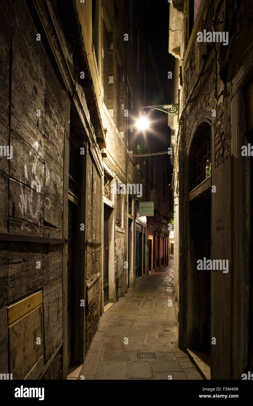 Venice, Italy. narrow street or 'calle' at night Stock Photo