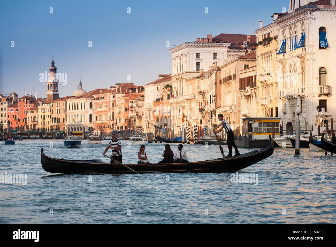 Venice, Italy. Gondoliere in traditional venetian water transport, the gondola Stock Photo