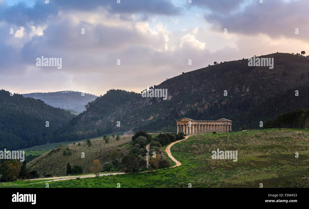 Landscape and doric temple at sunset in Segesta archaeological area, Sicily Stock Photo