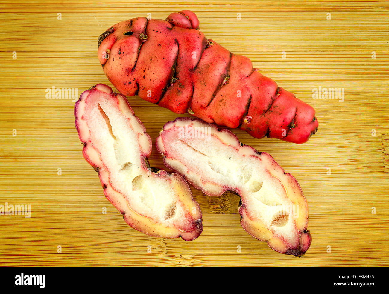 Cross sections of pink oca new zealand yams aerial shot Stock Photo