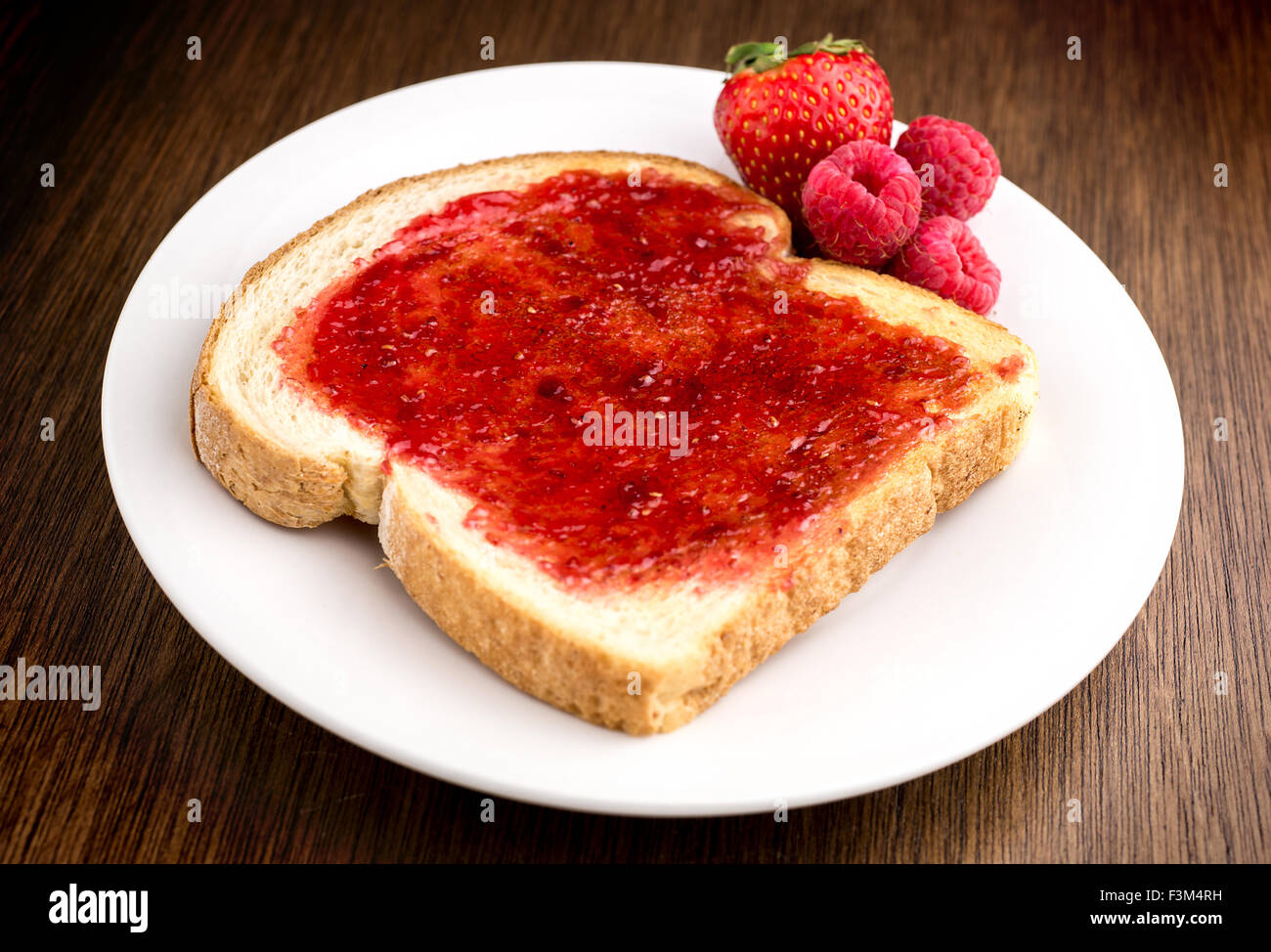 Mixed fruit jam on toast Stock Photo Alamy