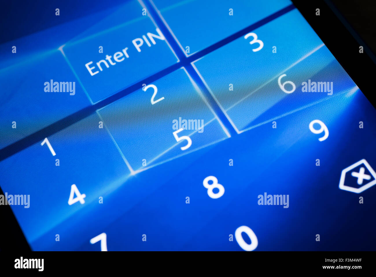 The pin number keypad to unlock a Windows 10 smartphone. Stock Photo