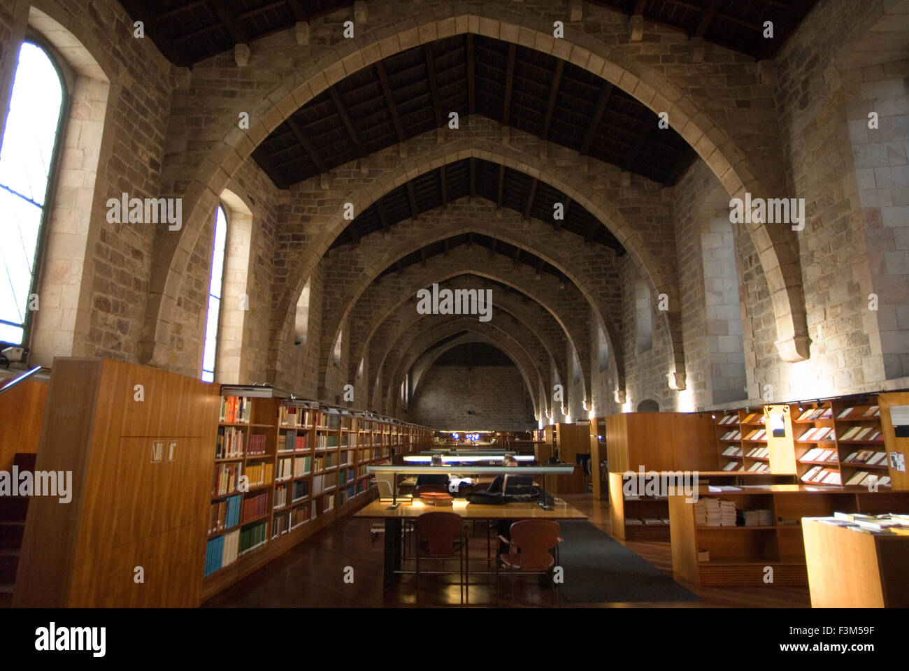 Josep Laporte Library in Santa Creu y Sant Pau Hospital, Barcelona. In the Middle Ages, Barcelona became the Ciutat Comtal (Count’s City) and its political importance increased. It became the seat of the main political institutions in Old Catalonia and that favoured the development of trade which, in turn, led to the city’s growth and expansion, and the construction of some magnificent Gothic-style buildings. Stock Photo