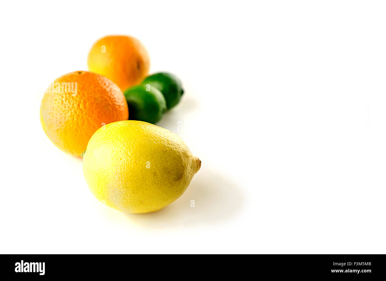 Perspective of colorful citrus fruits in a line Stock Photo