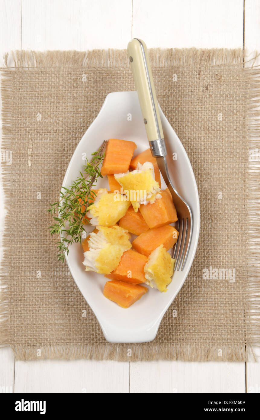 boiled sweet potato with smoked cod and thyme Stock Photo - Alamy