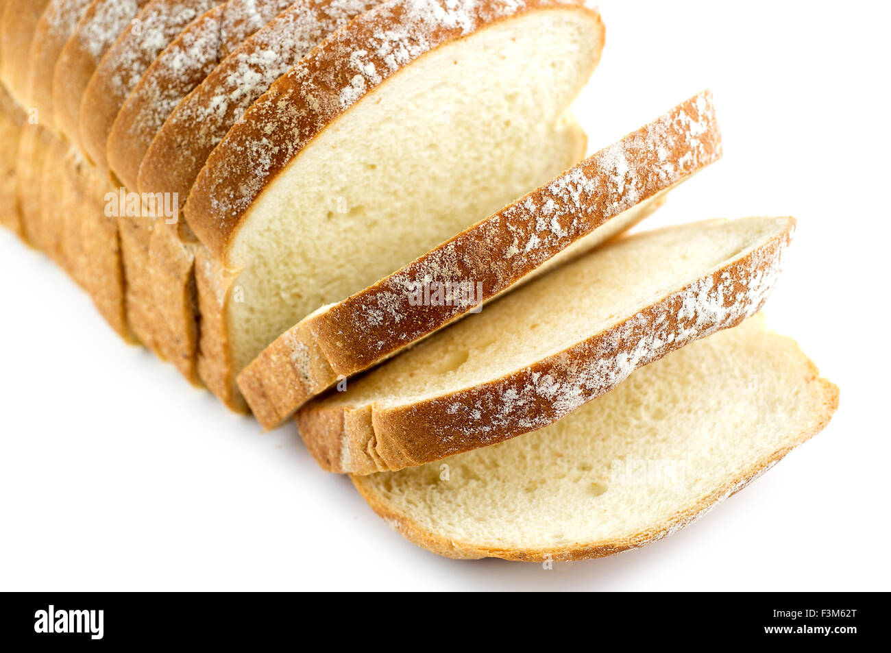 Loaf of bread, sliced, isolated on white Stock Photo