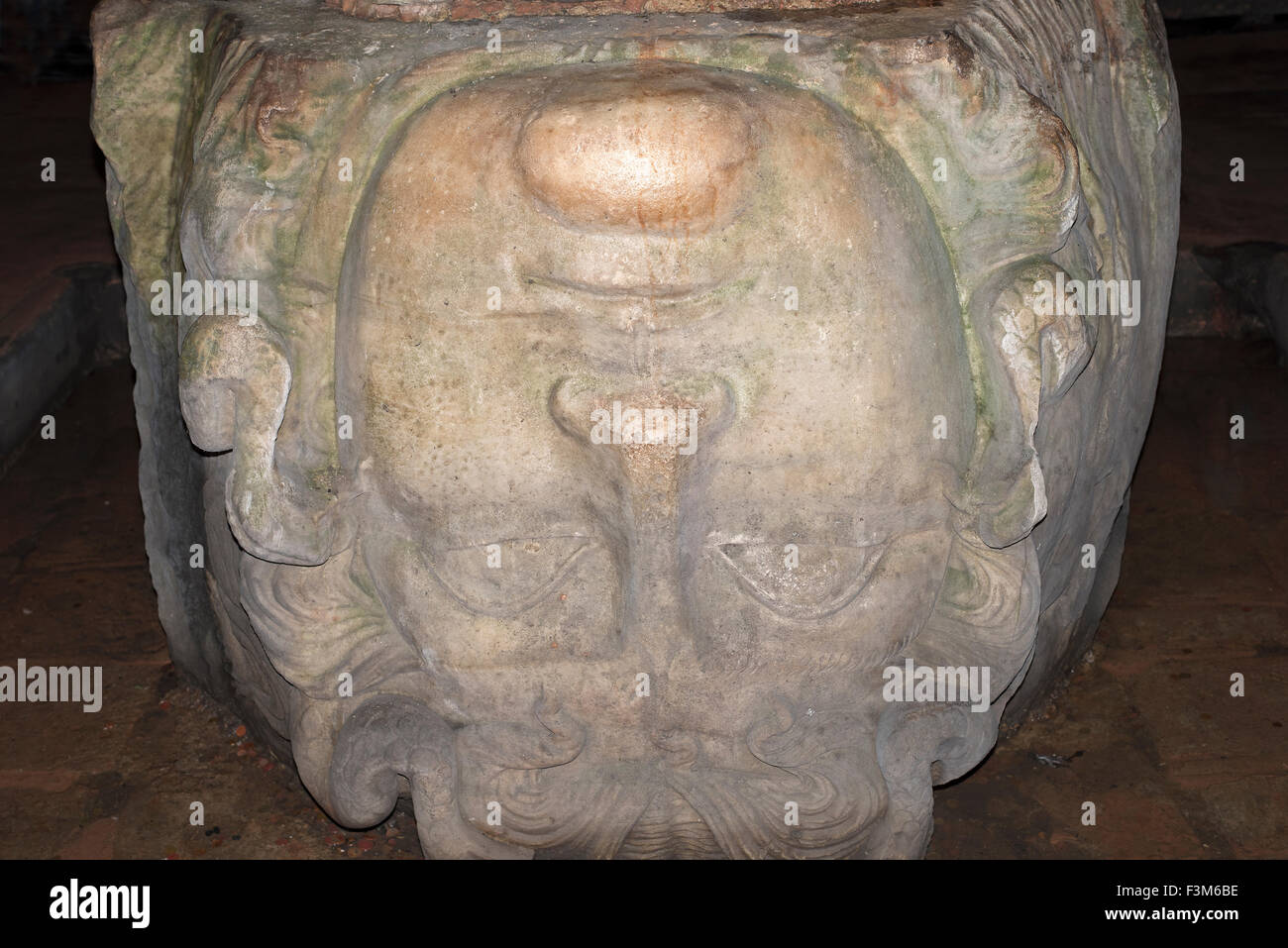 Upside down Medusa Head, Basilica Cistern (Yerebatan Sarnici) Istanbul, Turkey. Stock Photo