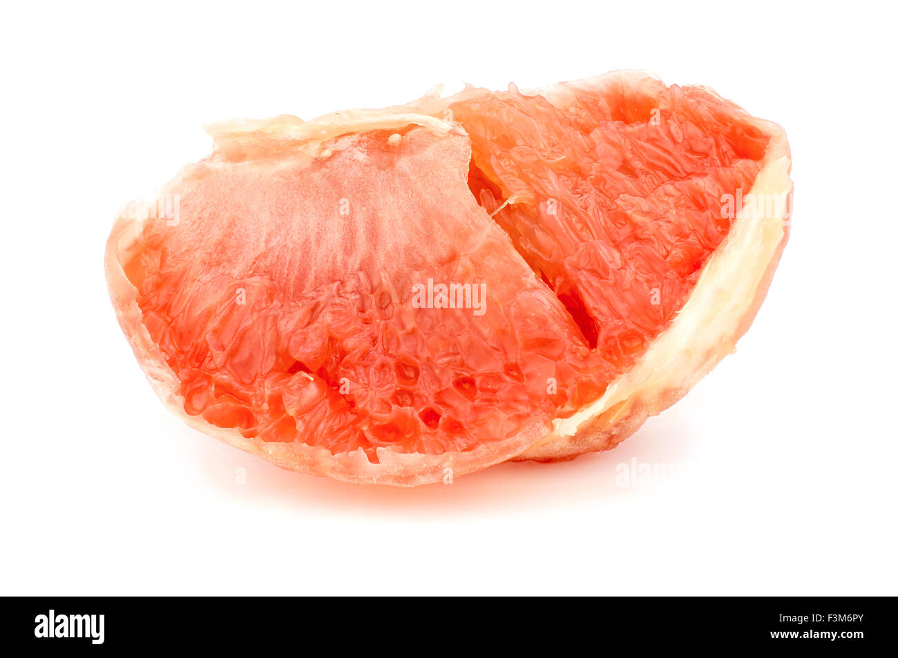 Macro closeup of juicy ripe slice of grapefruit Stock Photo