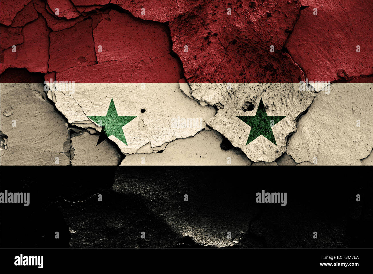 flag of Syria painted on cracked wall Stock Photo