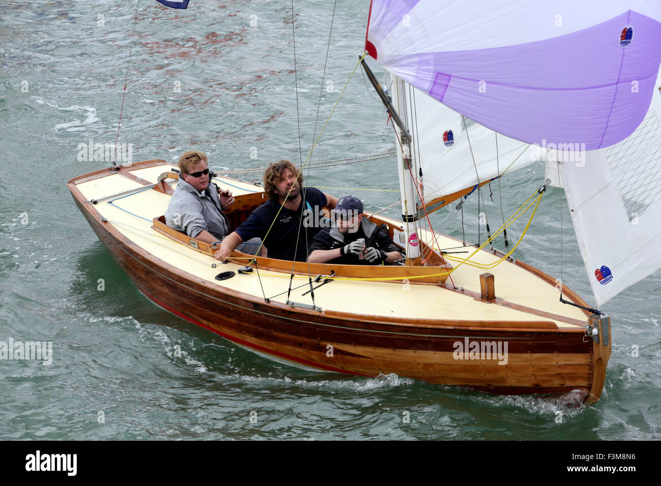 Yachts racing X Boats XOD Spinnaker run Egypt Point, Cowes Week beach spectators England UK
