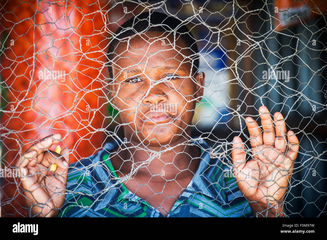 Portrait,Botswana,Woman,Chicken Wire Stock Photo