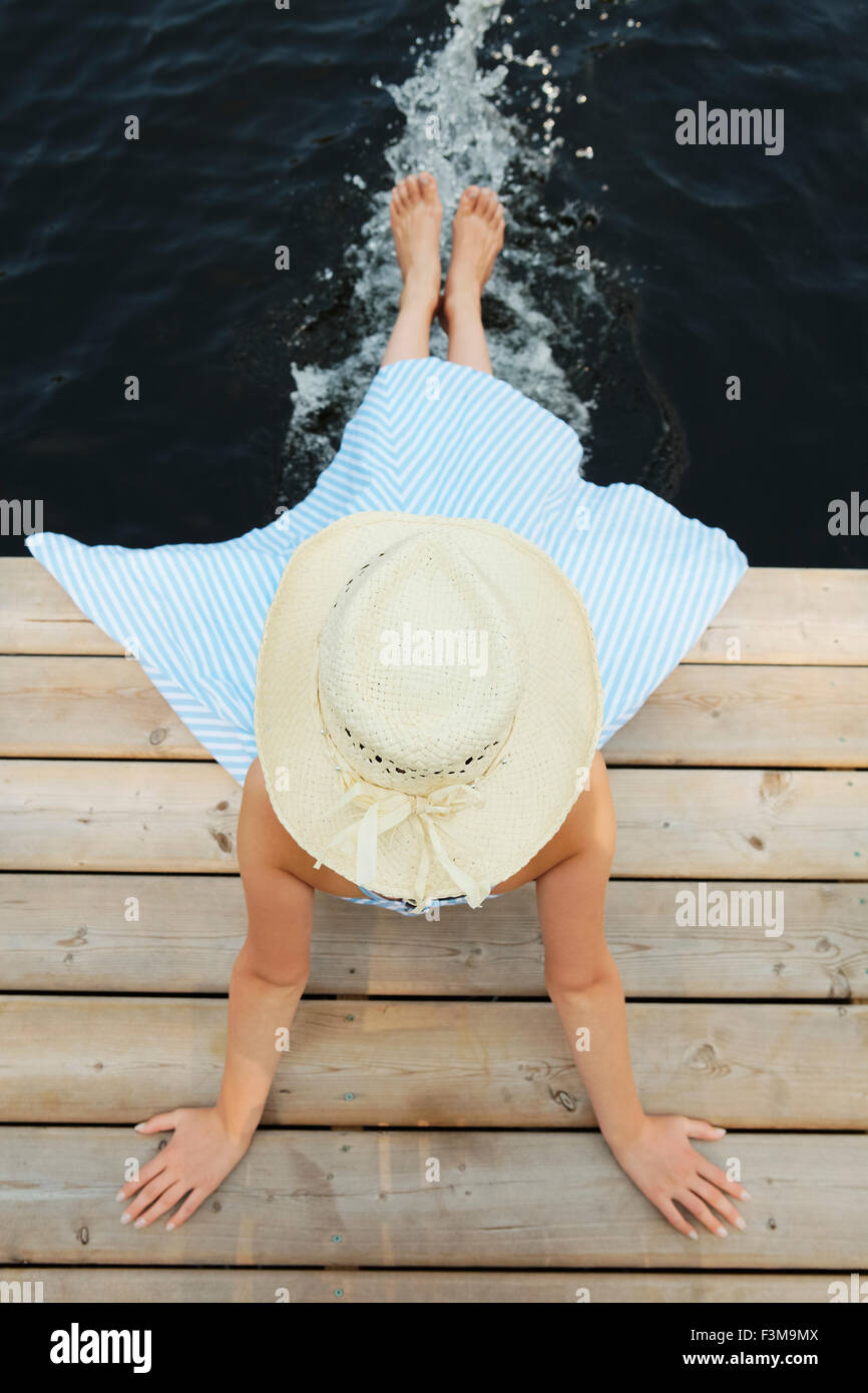 Jetty,Teenage Girl,Lake,Sun Hat Stock Photo