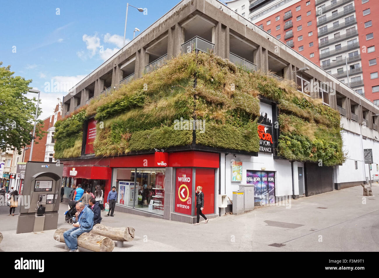 A 'living wall' of plants growing up the exterior walls of Wilko's in Sutton, London Stock Photo