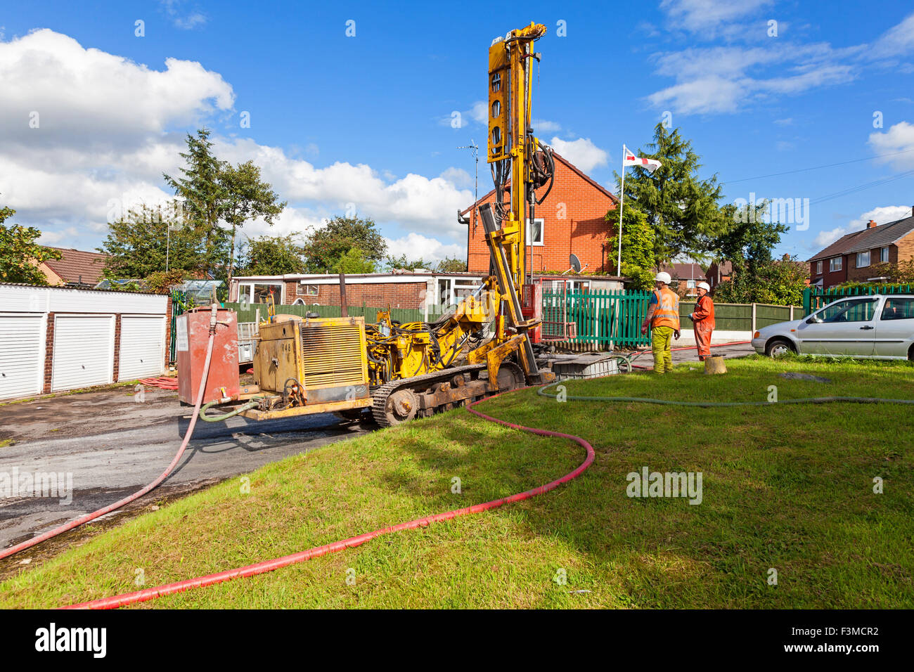 A mobile drilling rig drilling bore holes to assess the ground conditions Stock Photo