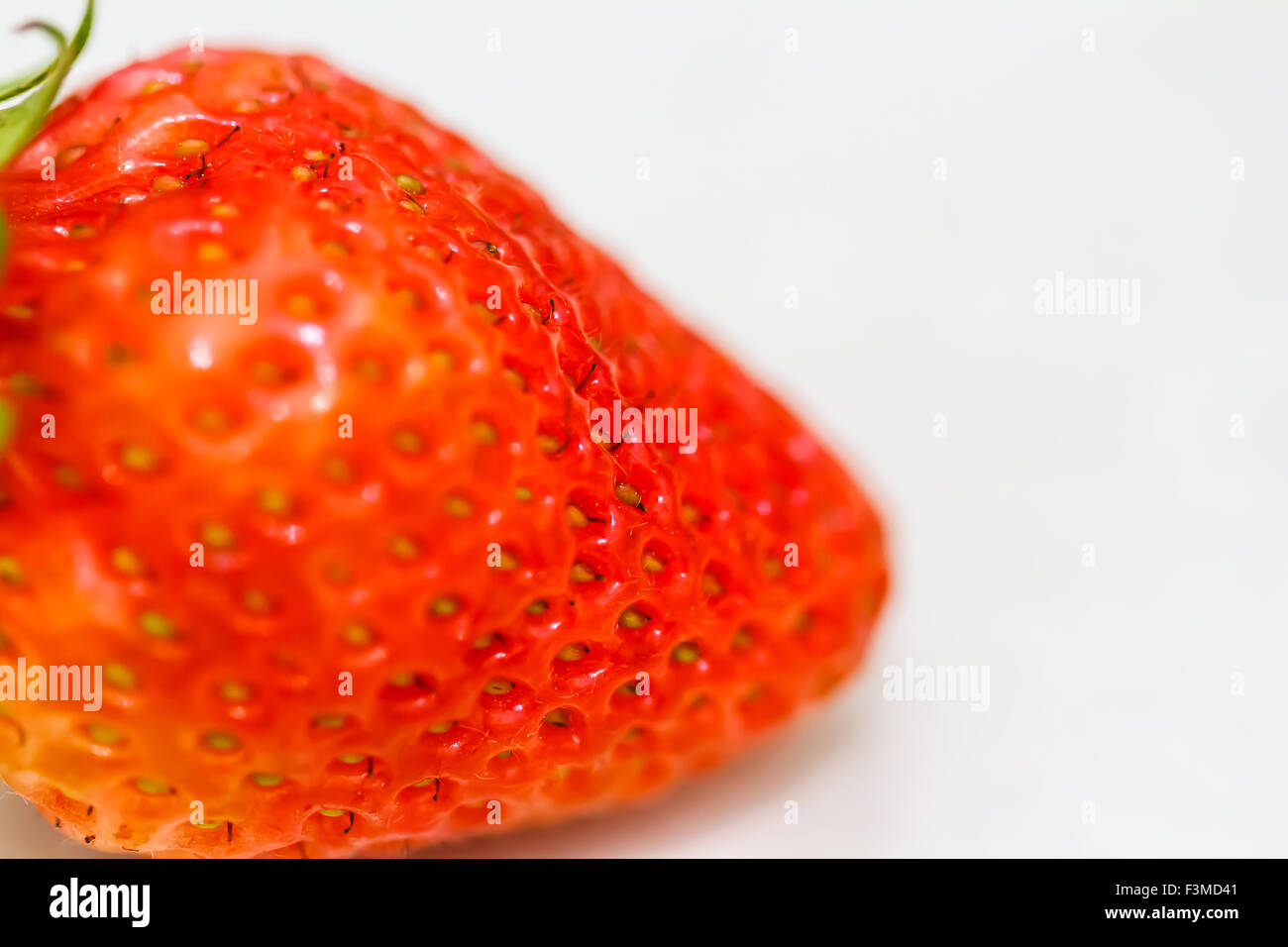 Strawberry berries on a white background Stock Photo - Alamy