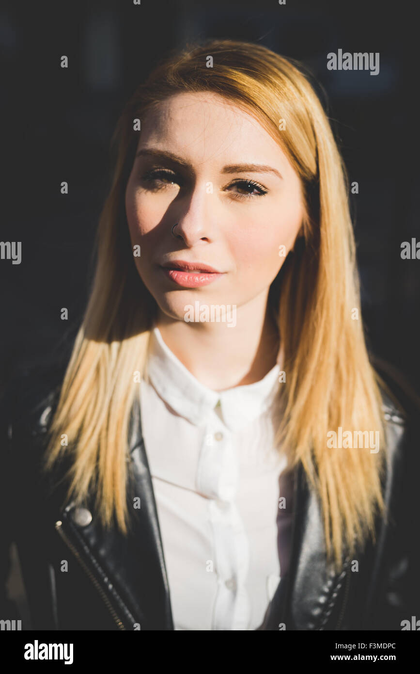 Blonde woman in leather hi-res stock photography and images - Alamy