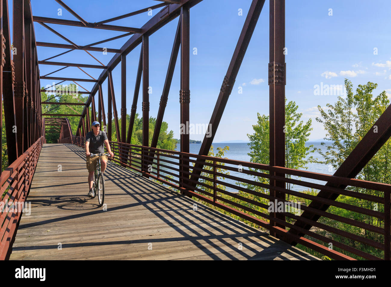 Man biking on the Burlington Bike - Man Biking On The Burlington Bike Path By Lake Champlain Burlington F3MHD1 