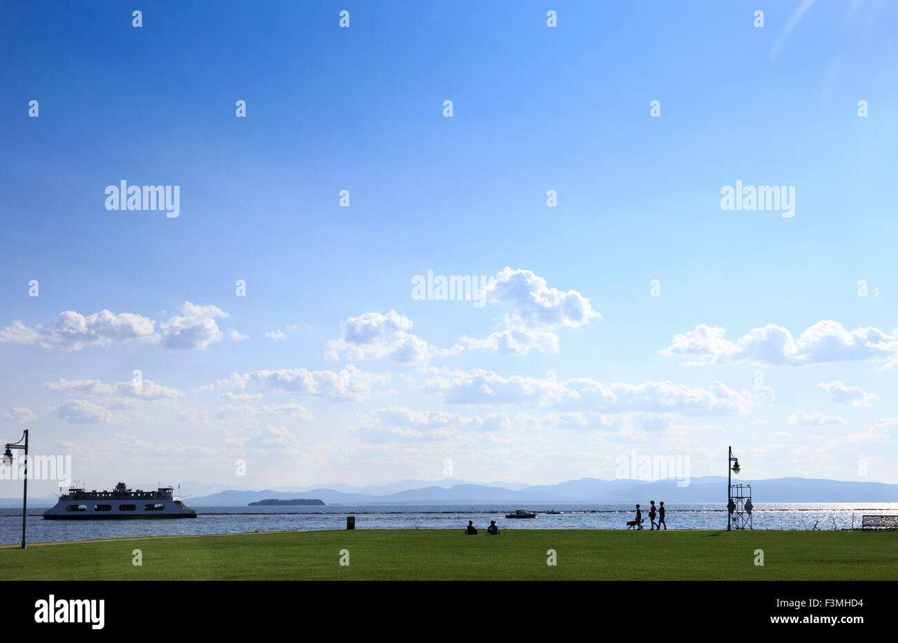 Waterfront Park on Lake Champlain with Ferry to Port Kent , Burlington, Vermont, USA Stock Photo