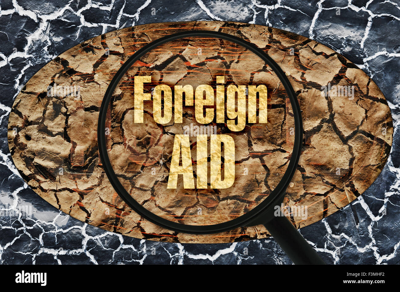 Text Foreign Aid under a magnifier on abstract background Stock Photo