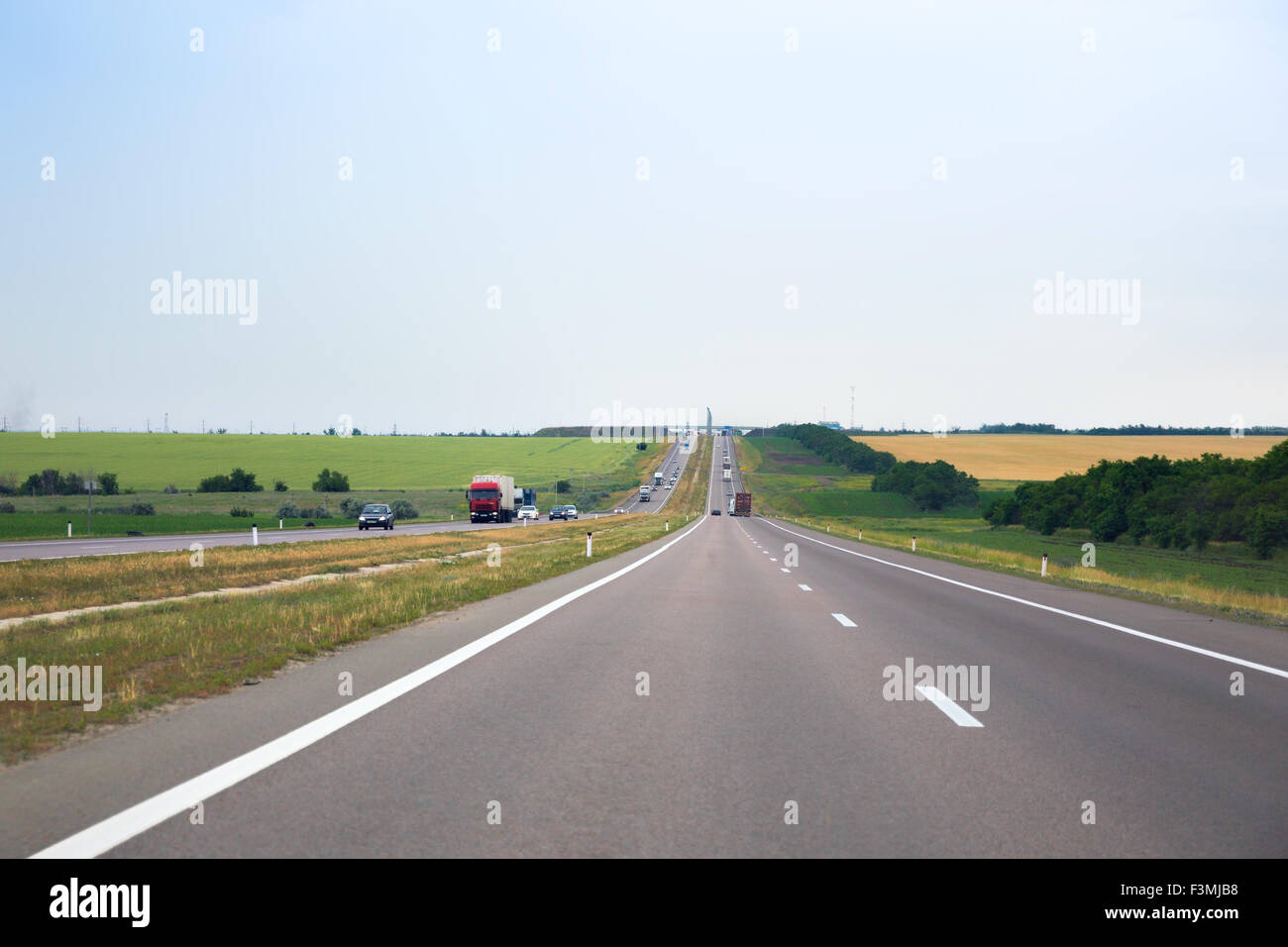 Intercity highway with traffic in Russia Stock Photo