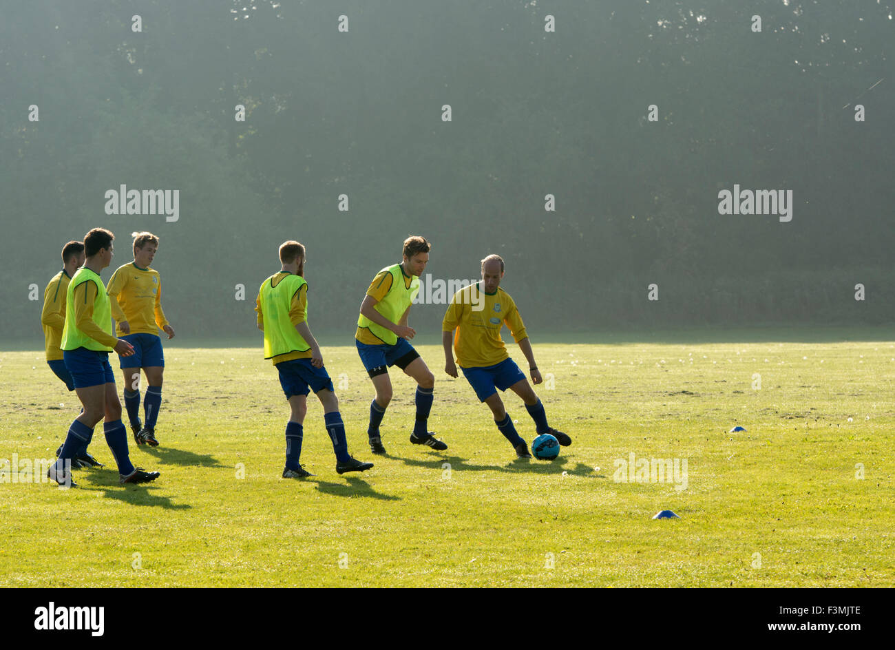 Sunday League football, players warming up before a match, Warwick, UK Stock Photo Alamy