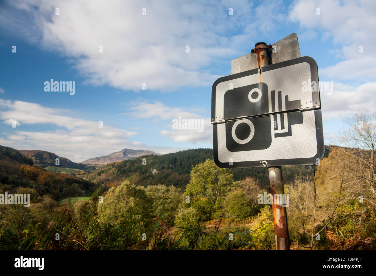 Speed camera sign with Moel Siabod mountain Snowdonia in background on A5 near Betws-y-Coed North Wales UK Stock Photo