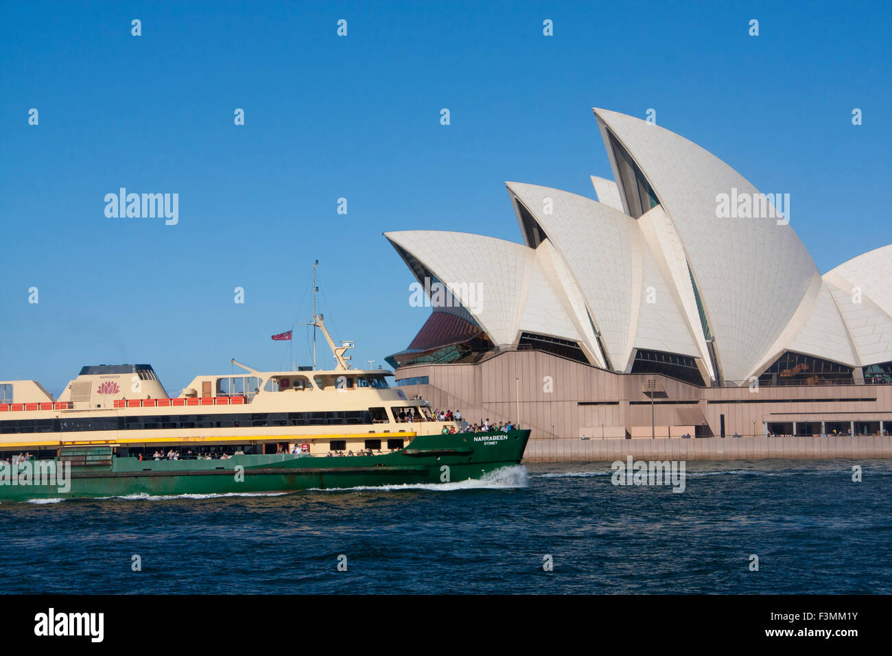 Sydney ferry Narrabeen passing Opera House on approach to Circular Quay Sydney Cove Sydney NSW Australia Stock Photo