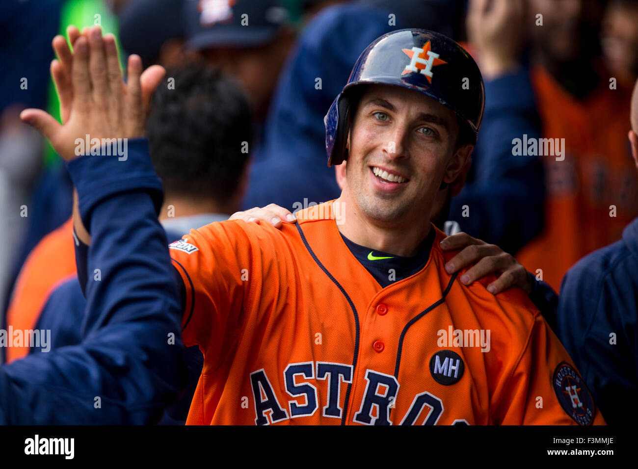 Kansas City, MO, USA. 09th Oct, 2015. Jason Castro #15 of the Houston Astros celebrates with his team after scoring in the second inning during Game 2 of the Divisional Series Playoff between the Houston Astros and the Kansas City Royals at Kauffman Stadium in Kansas City, MO. Kyle Rivas/CSM/Alamy Live News Stock Photo