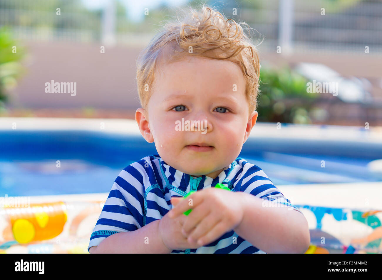 Baby paddling sea blue hires stock photography and images Alamy