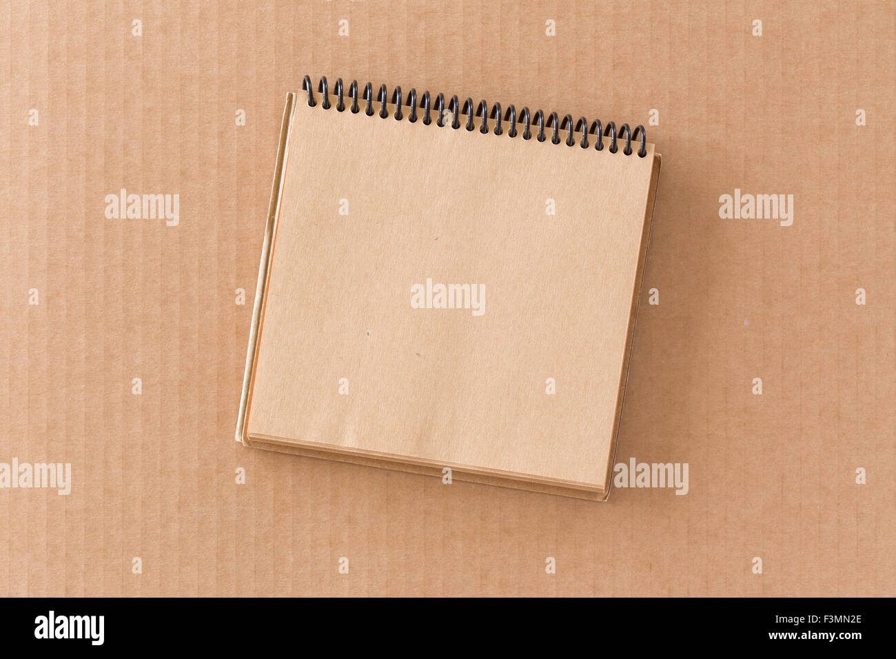 Notepad on cardboard Stock Photo Alamy