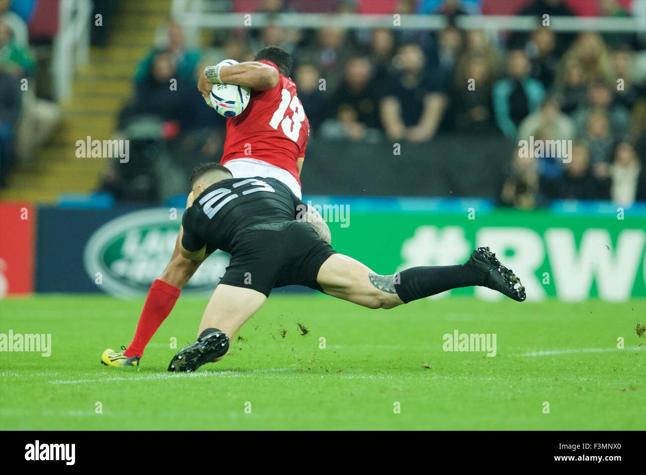 St James Park, Newcastle, UK. 09th Oct, 2015. Rugby World Cup. New Zealand versus Tonga. New Zealand All Black centre Sonny Bill Williams tackles Tonga centre Sione Piukala. Credit:  Action Plus Sports/Alamy Live News Stock Photo