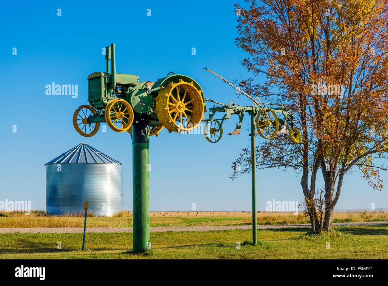 Old John Deere farm tractor and plough, Alberta, Canada Stock Photo Alamy