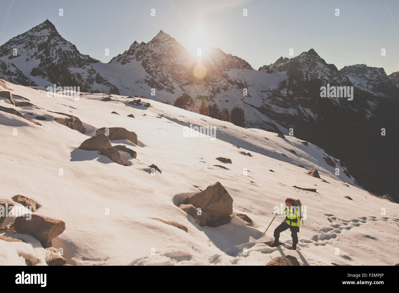 Snowshoeing on Canway Ridge with the Cheam Mountain Range in the background. Stock Photo