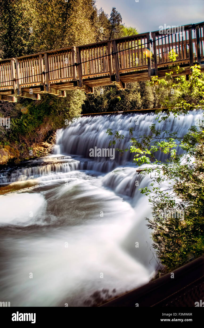 The wooden footbridge over Belfountain Falls Stock Photo Alamy