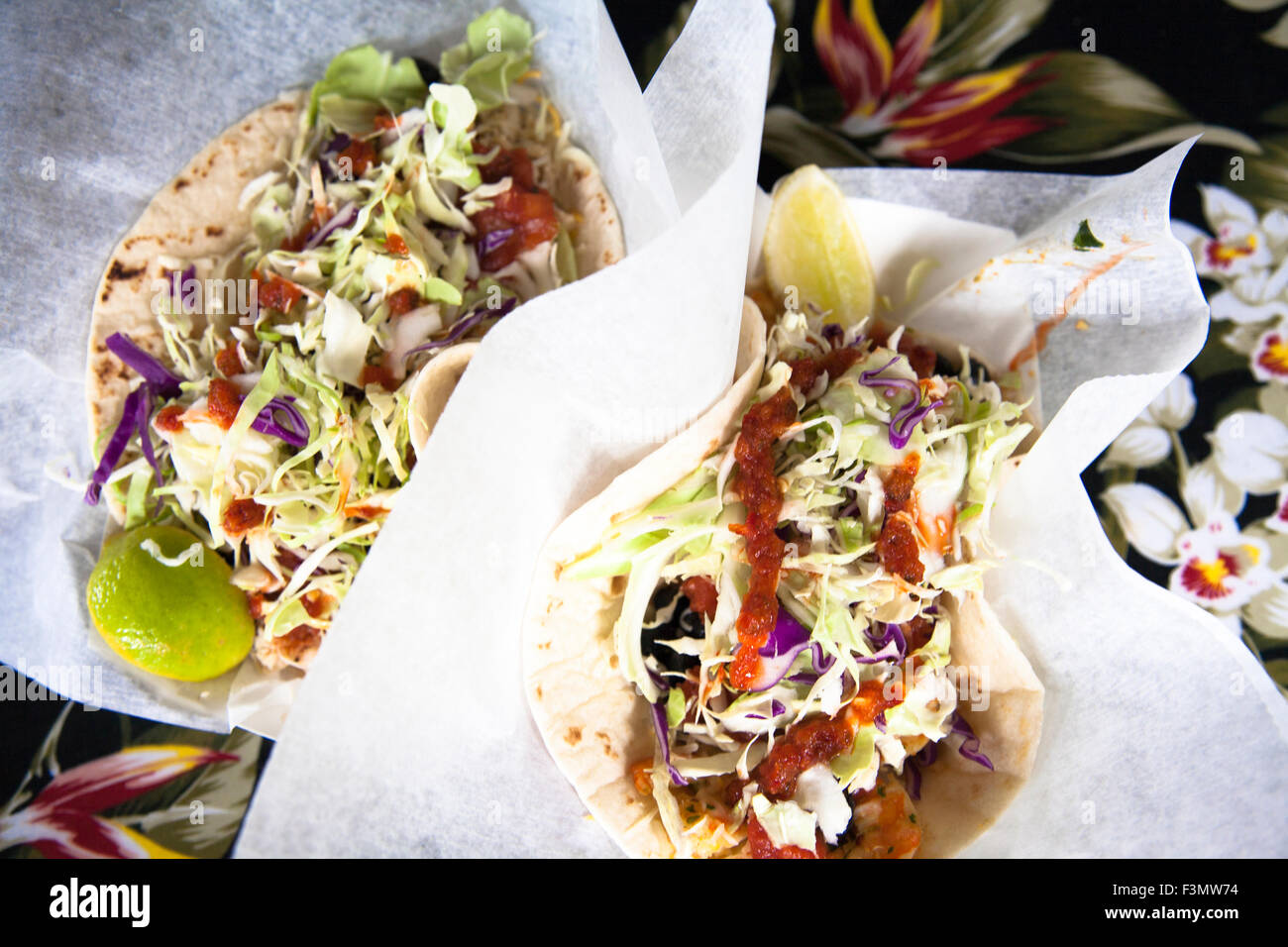 Two shrimp tacos from a roadside stand. Stock Photo