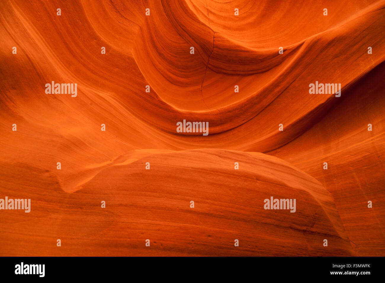 Background of vibrant orange swirling sandstone rocks inside of Upper ...