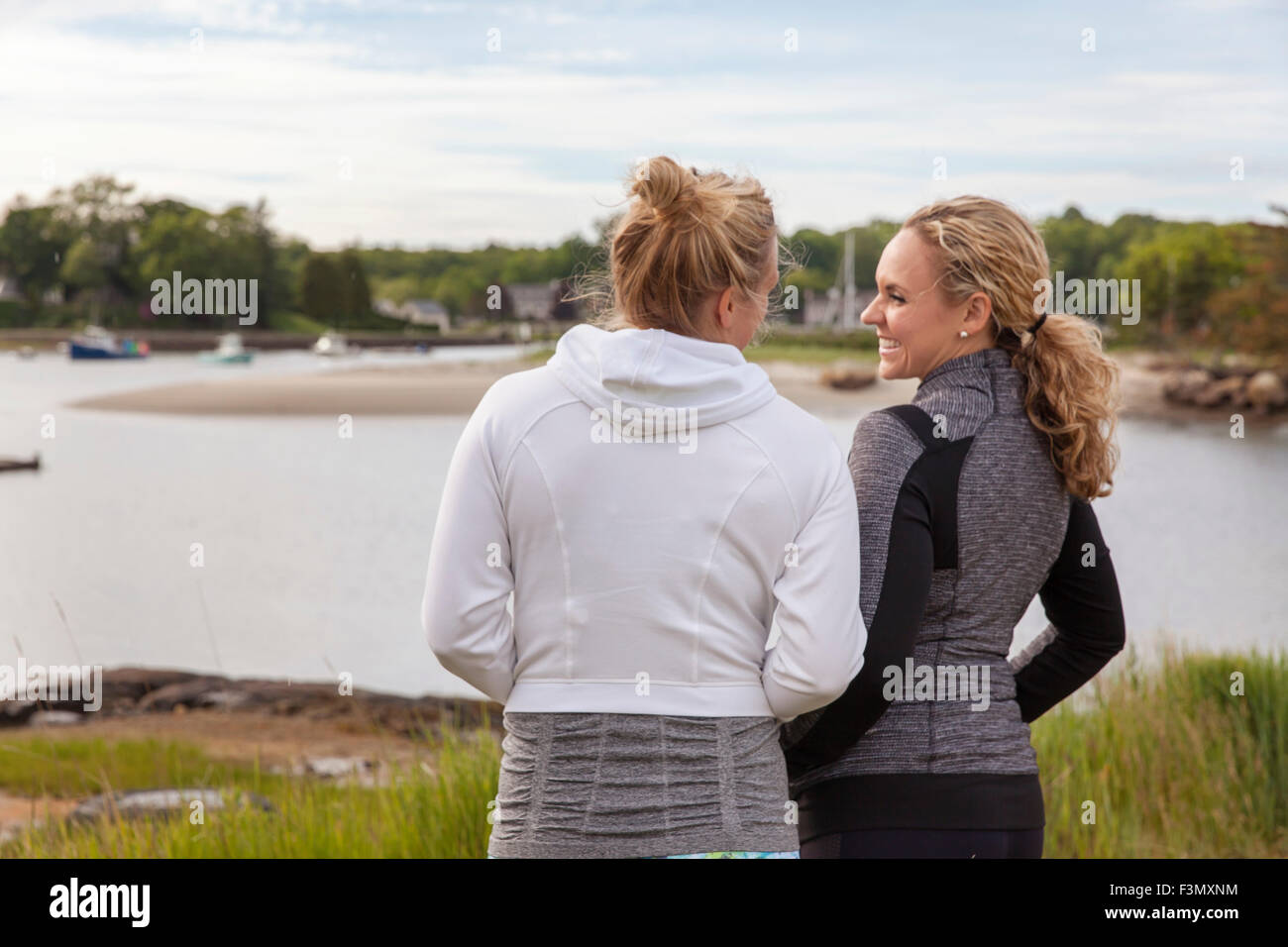 Standing two women laughing hi-res stock photography and images - Alamy