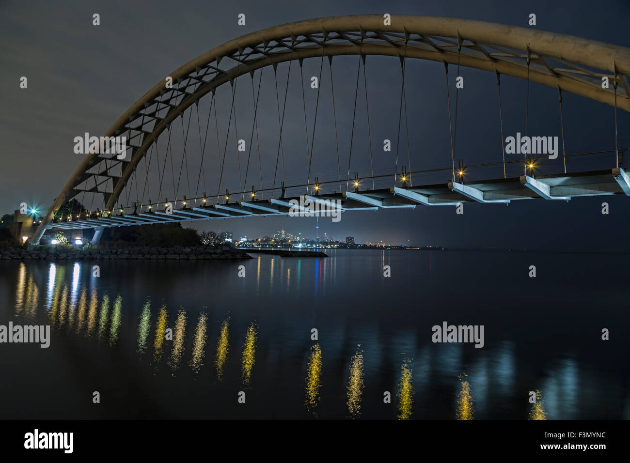 Humber Bay Arch Bridge with downtown Toronto seen in distance. Stock Photo